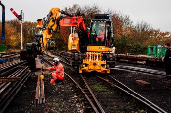  PTS operatives operating RRV on track moving sections of rail 